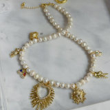 Heart charms pearl necklace