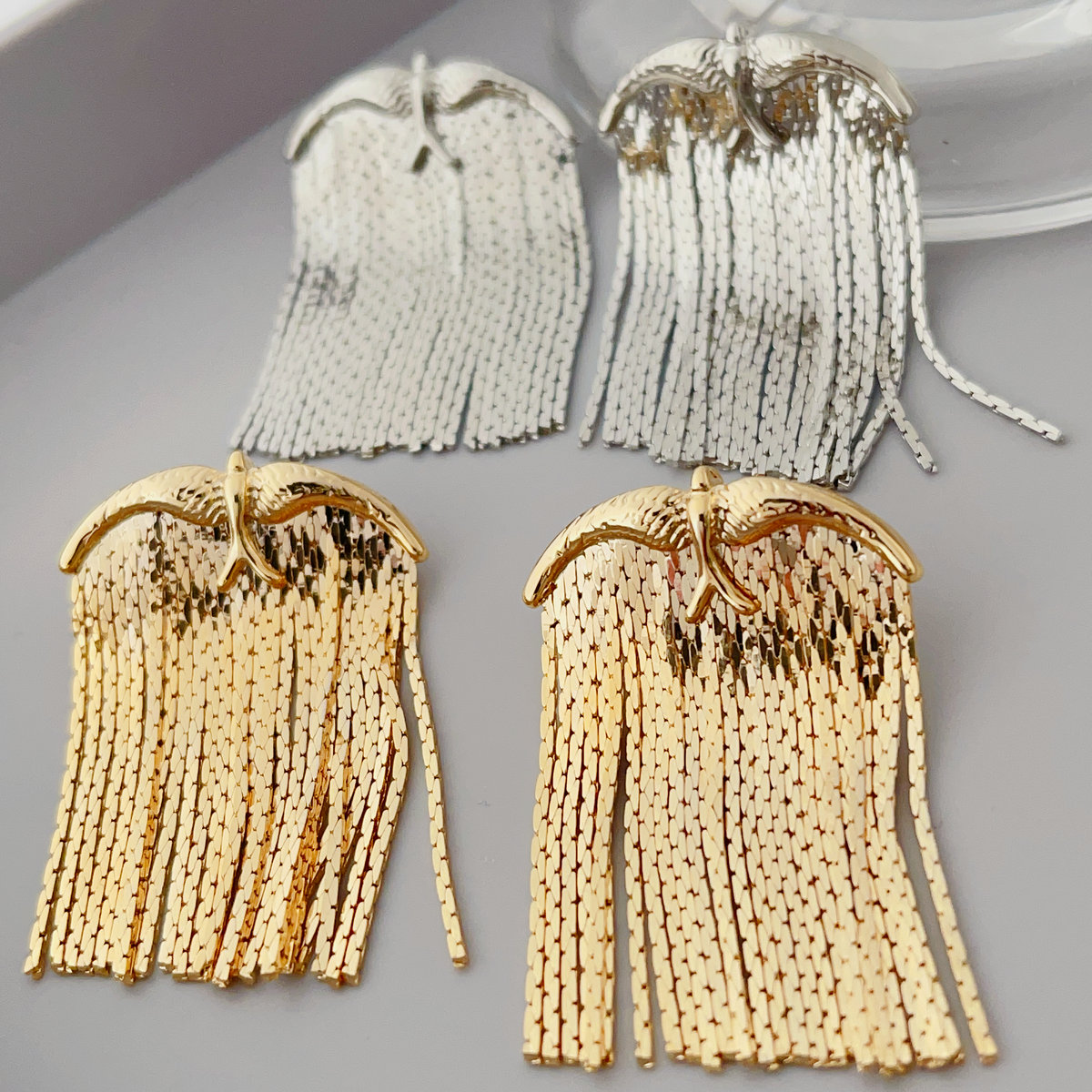 Bird chain tassel earrings