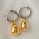 Gold oval drop earrings