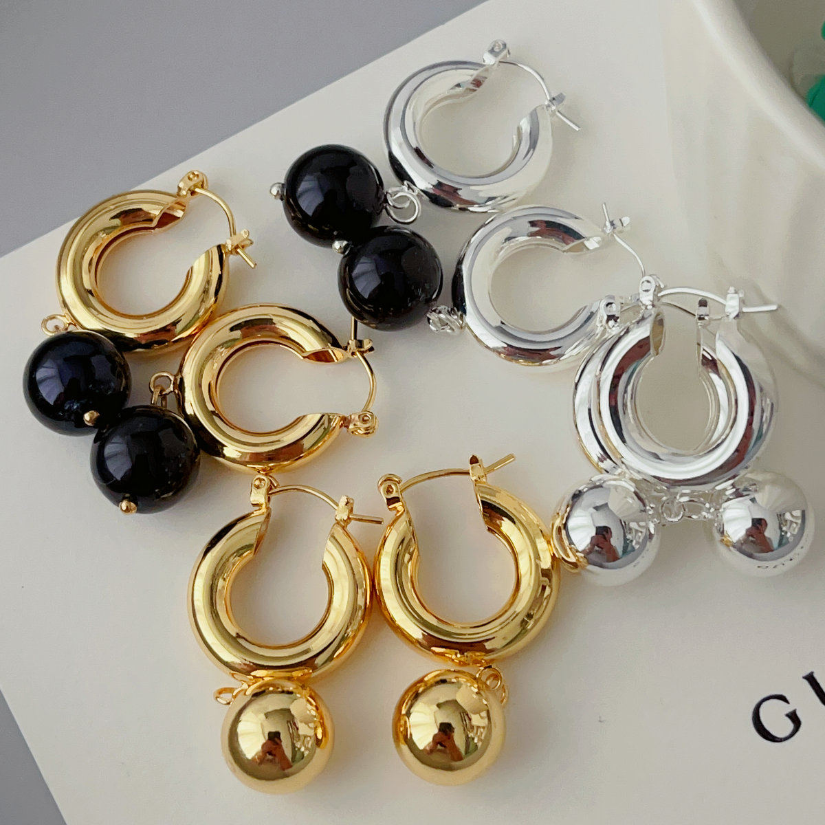 Gold ball drop earrings
