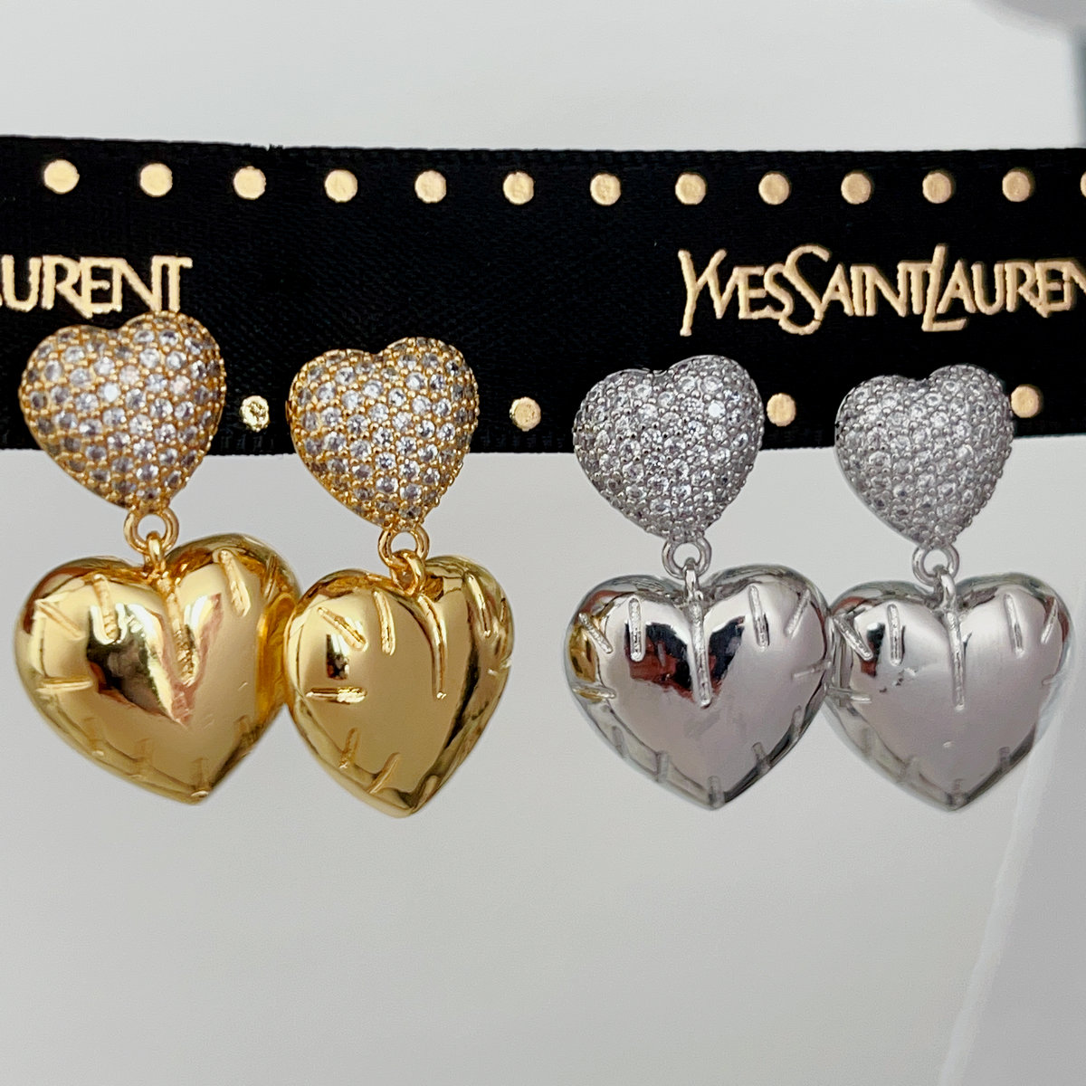 Metal heart pendant earrings