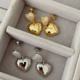 Metal heart pendant earrings