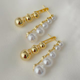 Half pearl and gold ball earrings