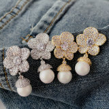 Pave zircon flower pearl drop earrings