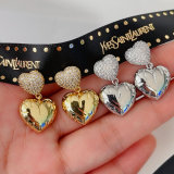 Metal heart pendant earrings