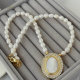 Shell pendant pearl necklace