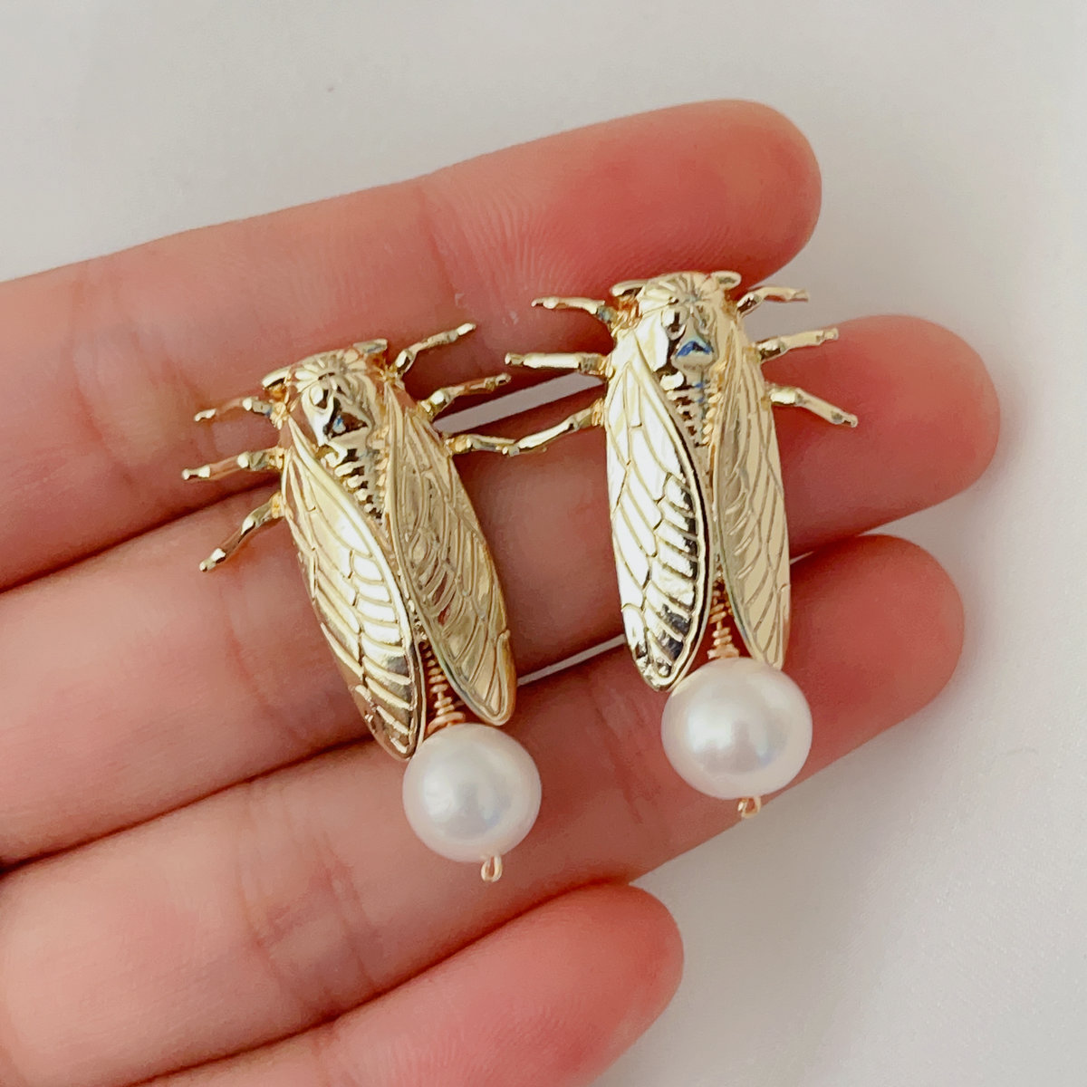 Cicada pearl earrings