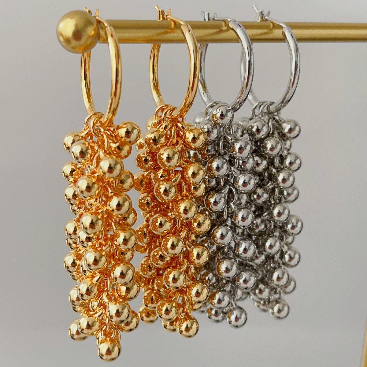 Long ball tassel earrings
