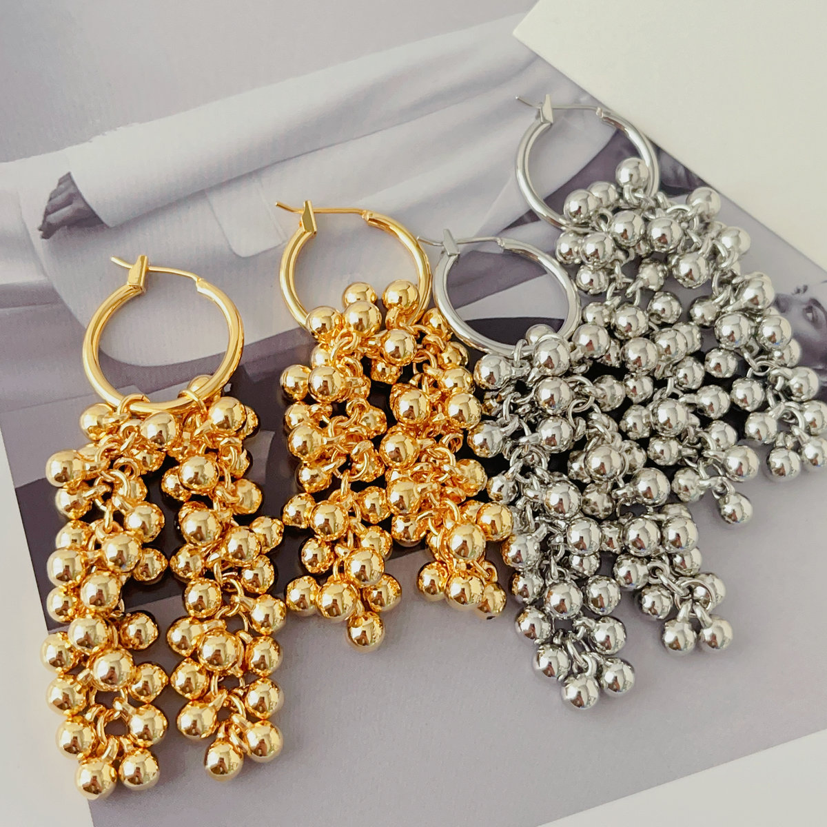 Long ball tassel earrings