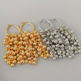 Long ball tassel earrings