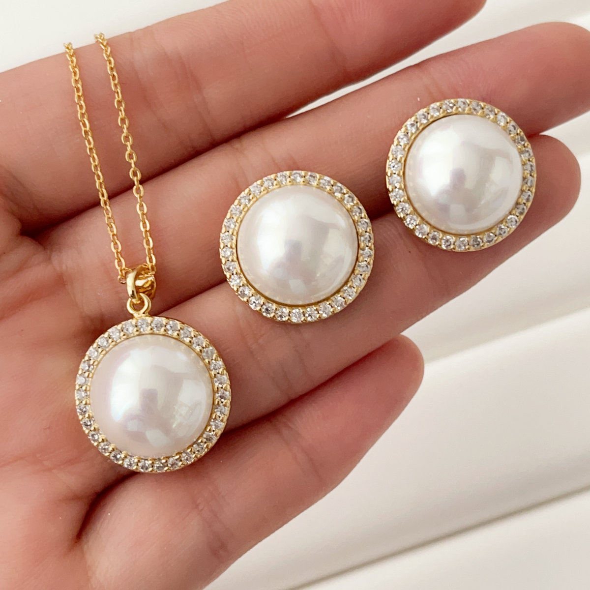 Round pearl set earrings and necklace