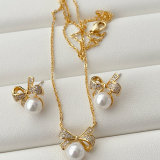 Bow pearl set earrings and necklace