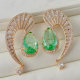 Green zircon s shape earrings