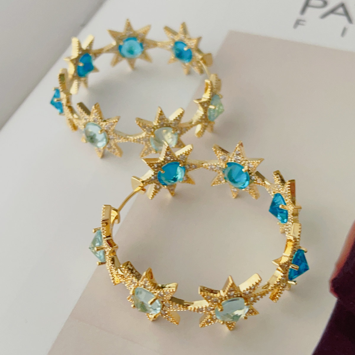 Green zircon star hoops