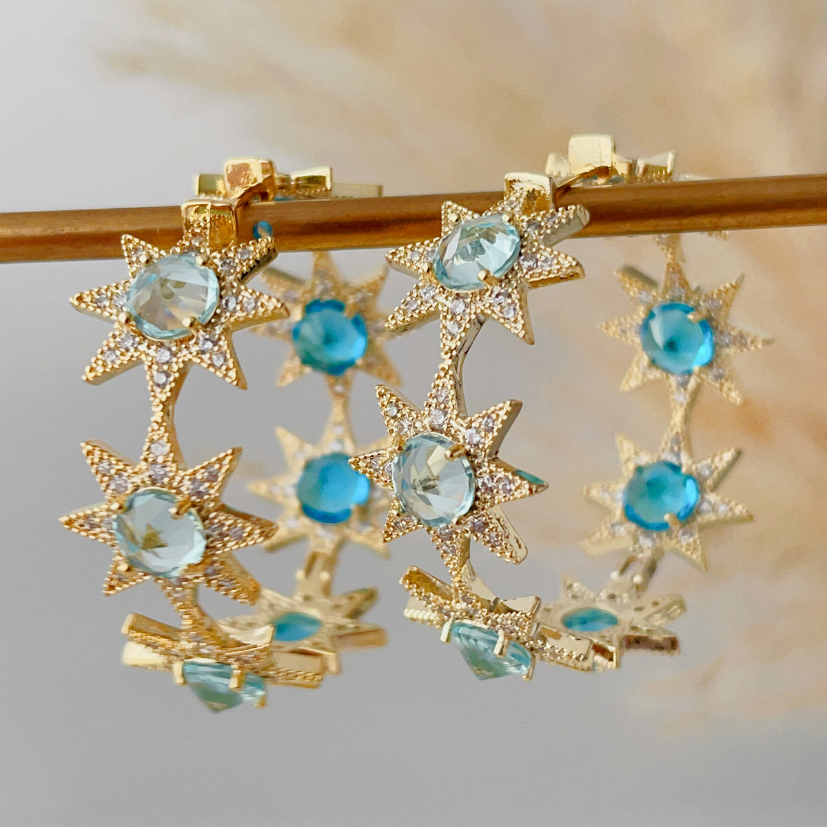 Green zircon star hoops