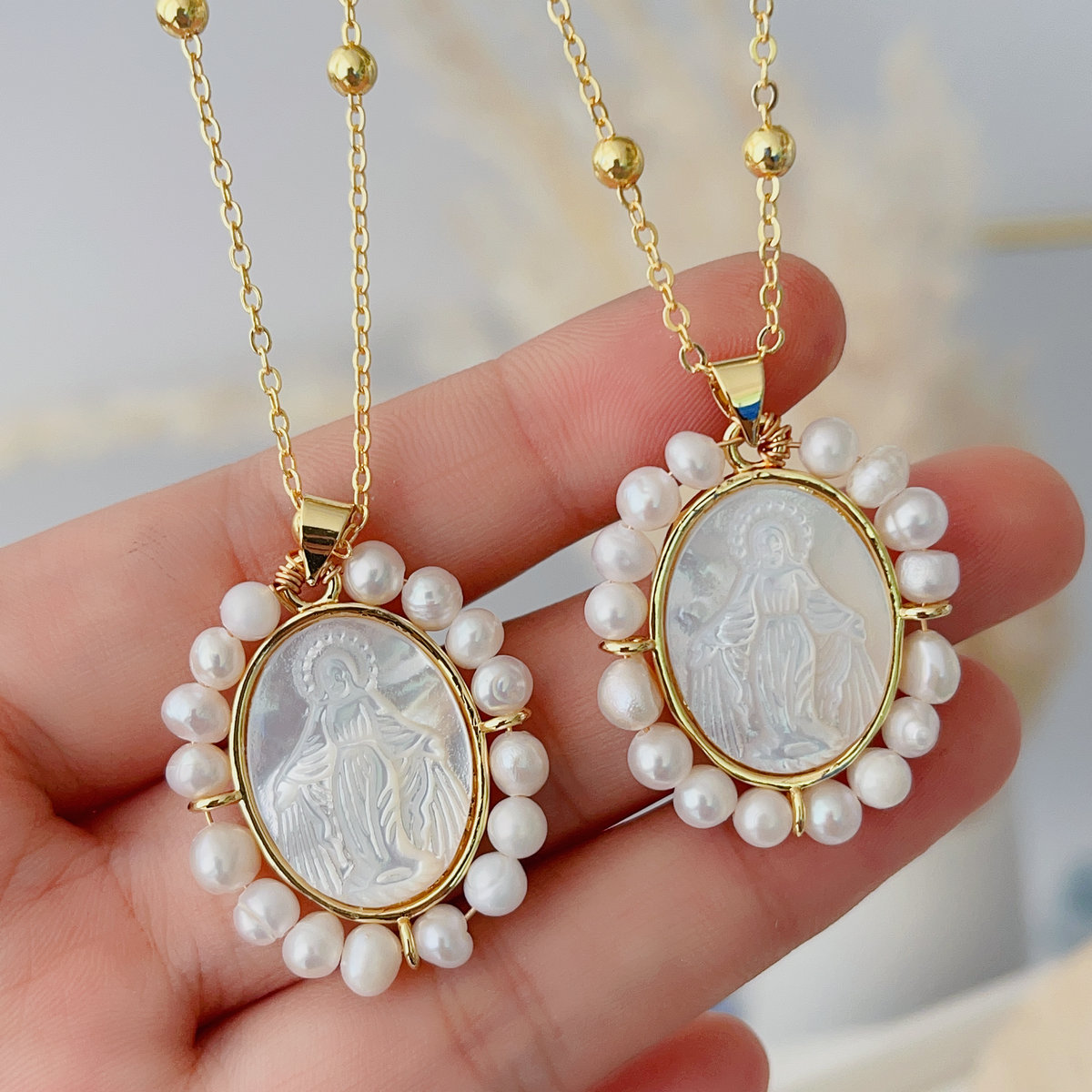 Pearl oval shell jesus pendant necklace