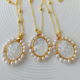 Pearl oval shell jesus pendant necklace