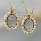 Pearl oval shell cross pendant necklace