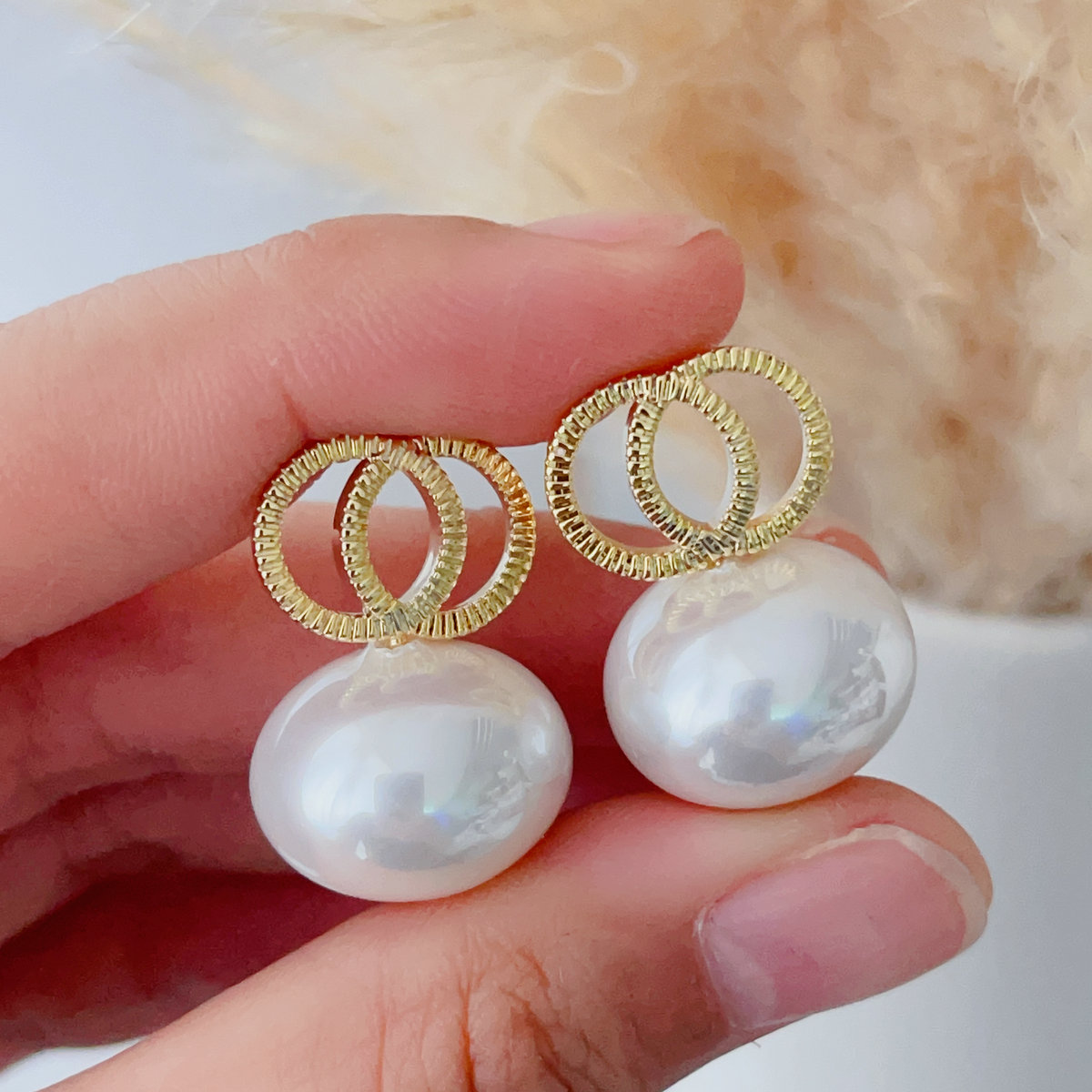 Round drop pearl earrings