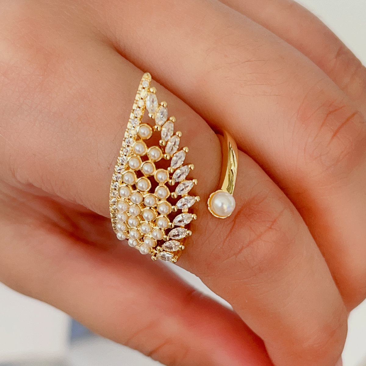 Pave wing ring