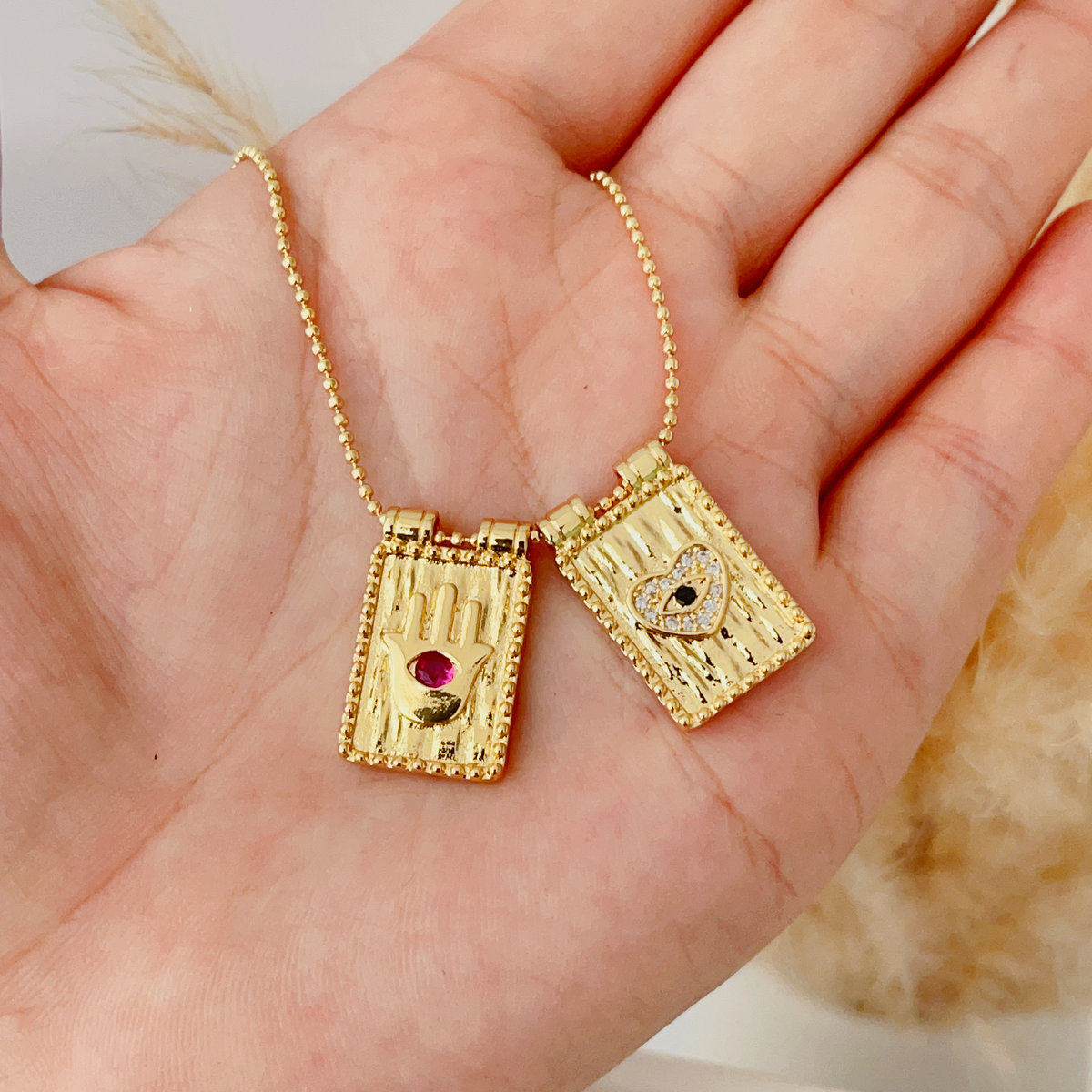 Dot chain with eye square charm