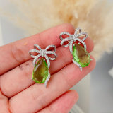 Green bow earrings