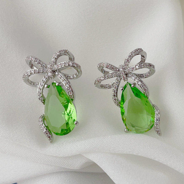 Green bow earrings
