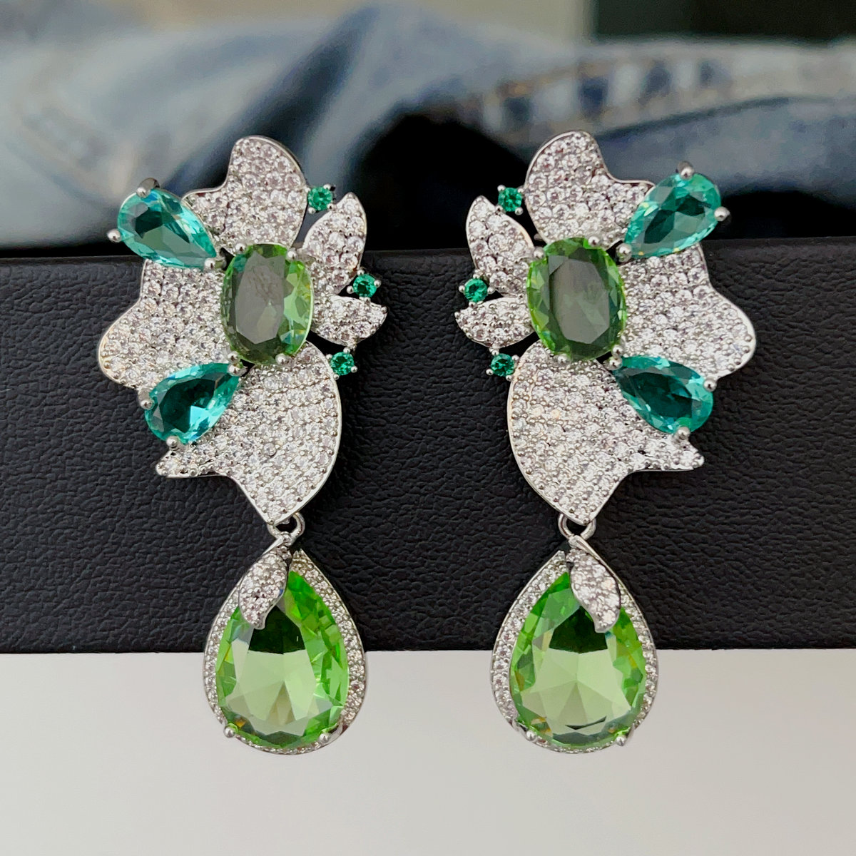 Pave green oval drop flower earrings