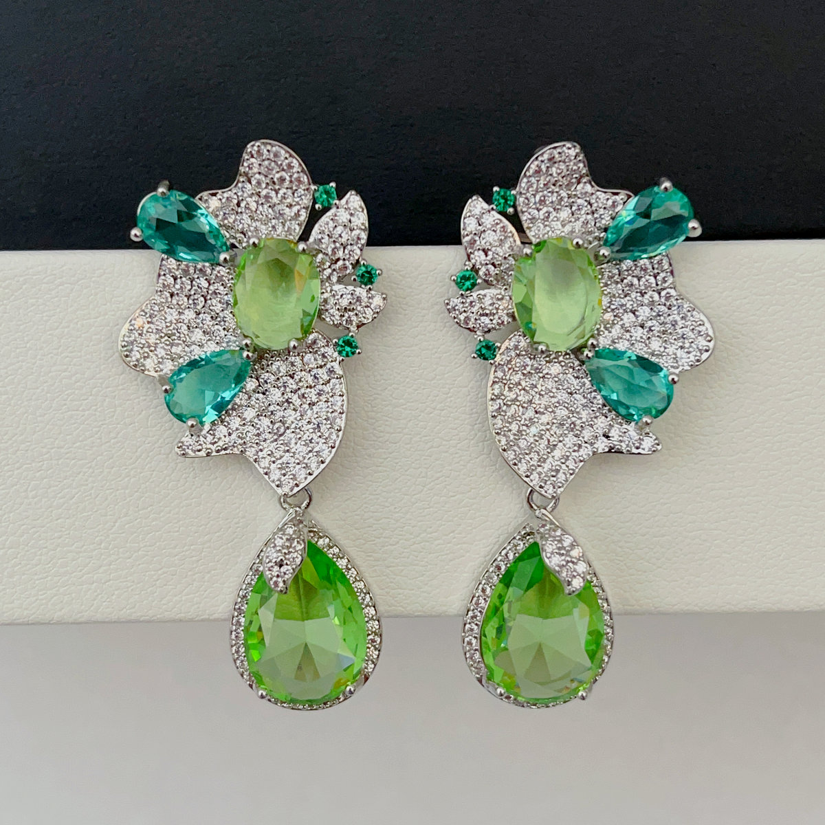 Pave green oval drop flower earrings