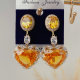 Yelllow big zircon heart earrings