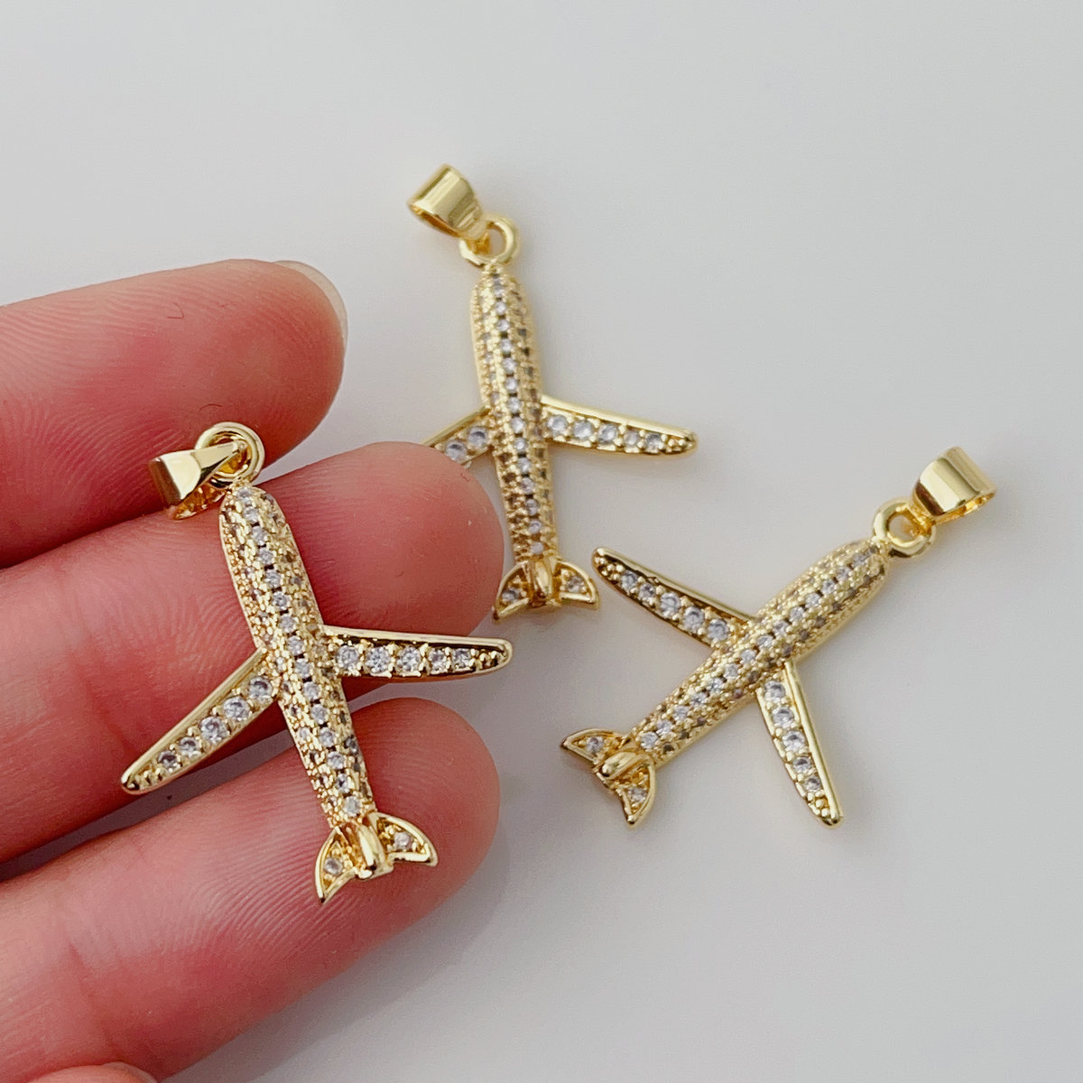 Pave clear aircraft pendant