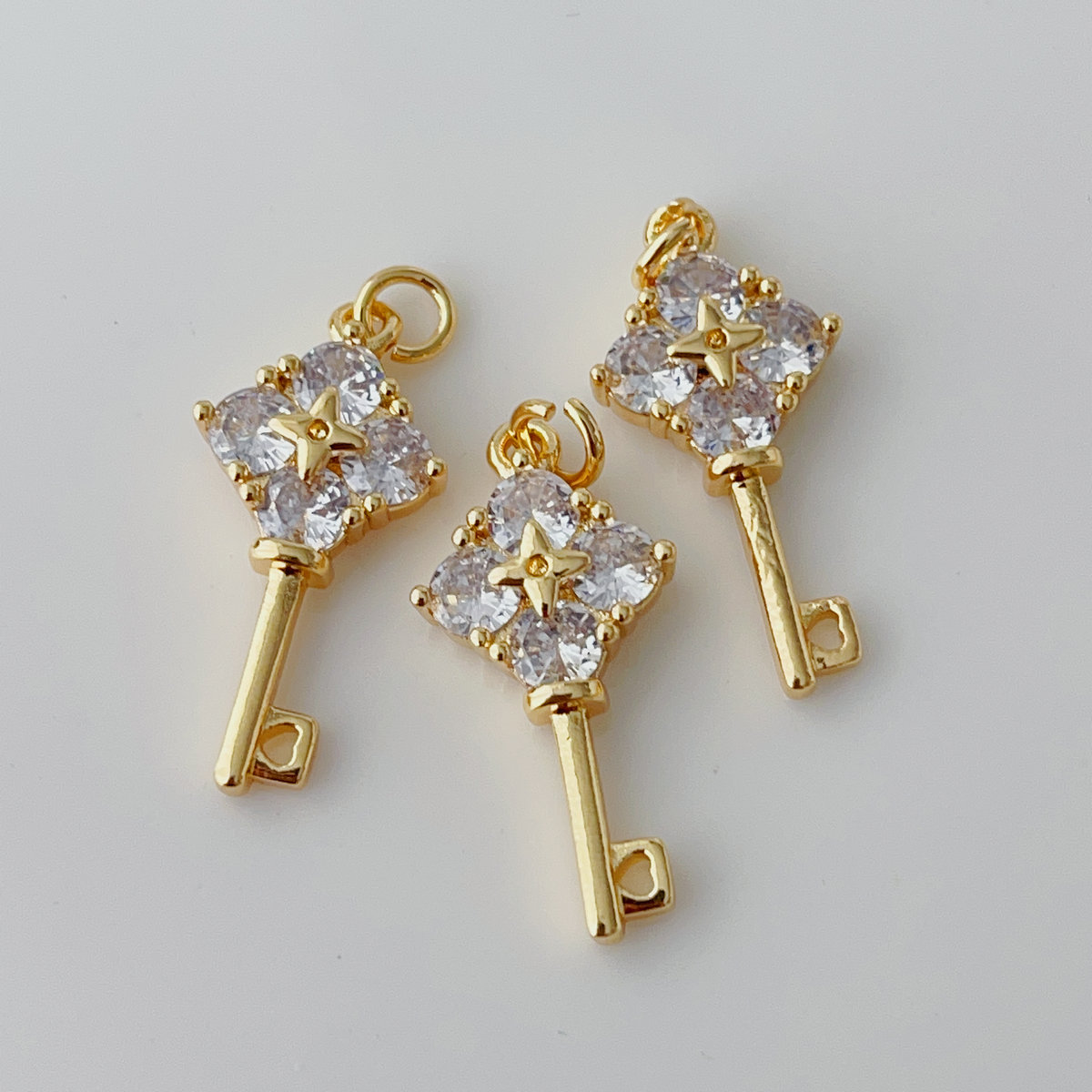 Pave key charm