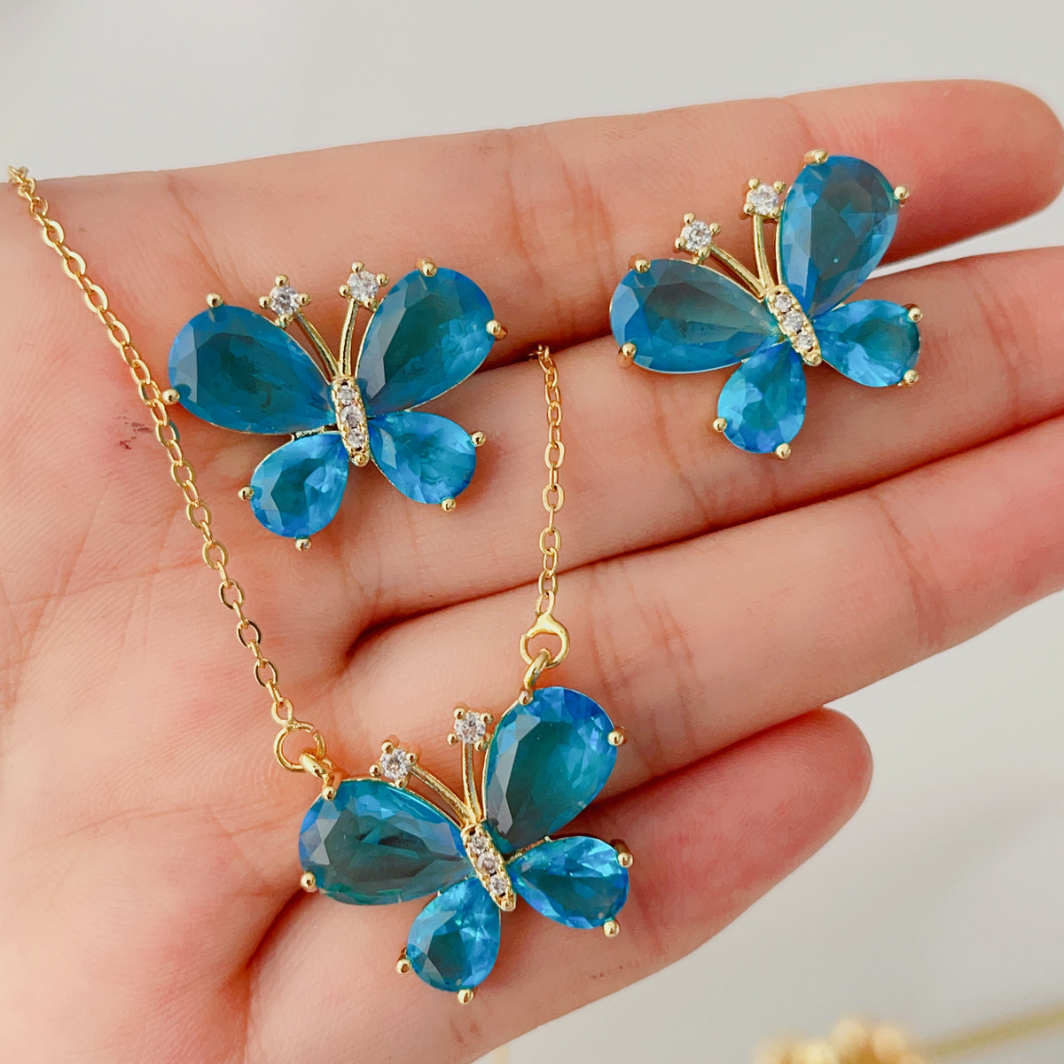 Blue crystal butterfly earring and necklace