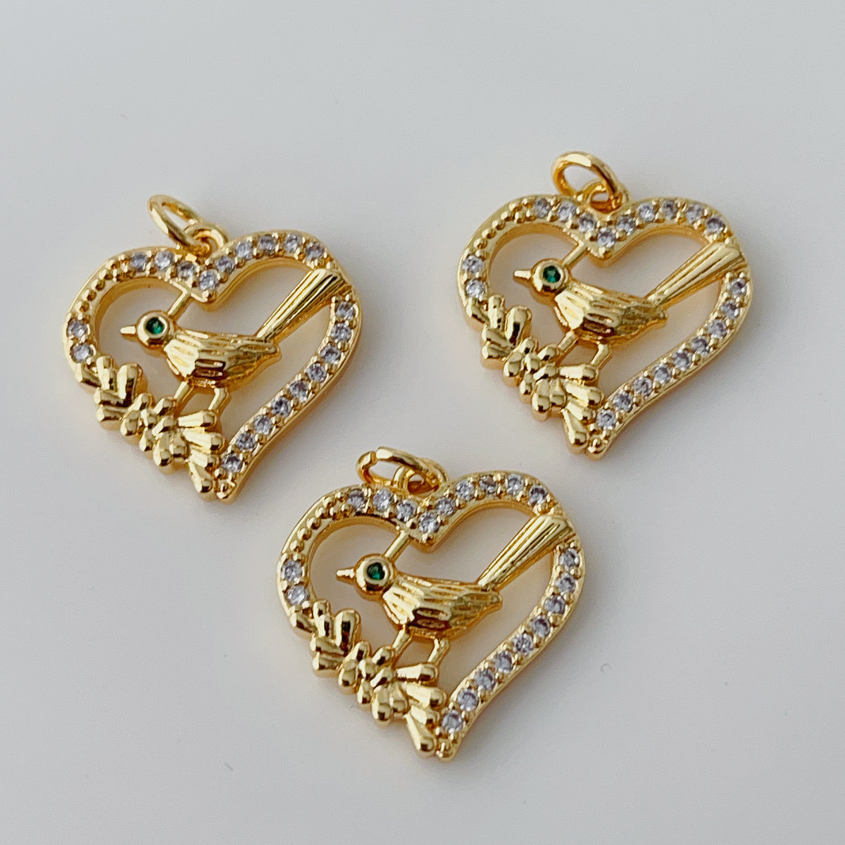Heart bird charm