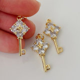 Pave key charm
