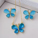 Blue crystal butterfly earring and necklace