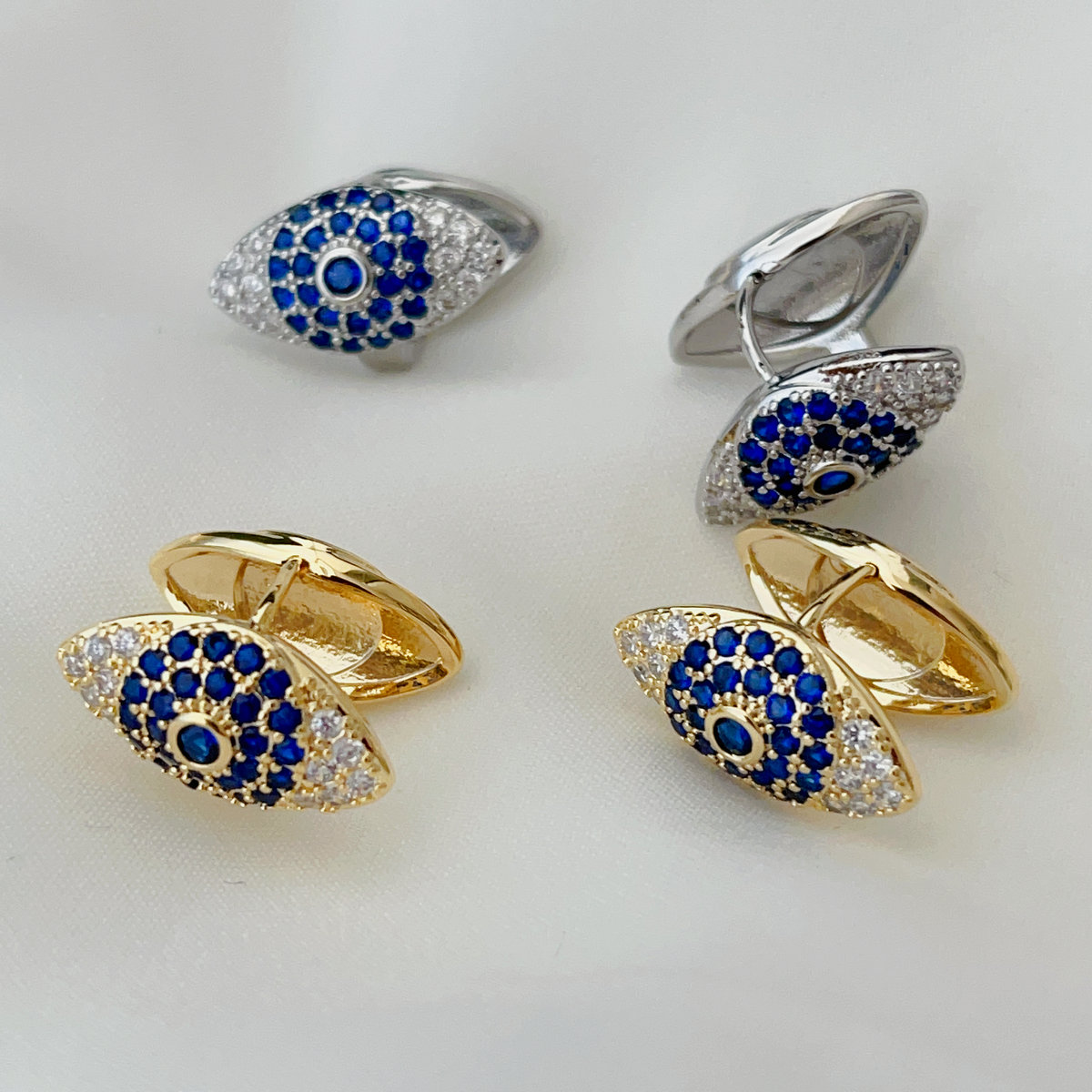 pave blue eye earrings