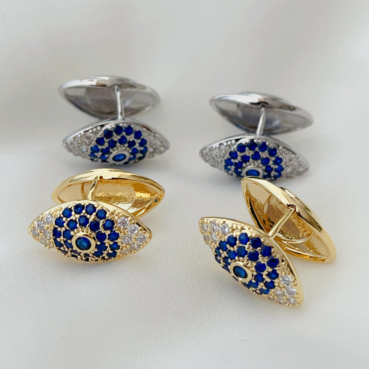 pave blue eye earrings