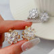 pave flower earrings