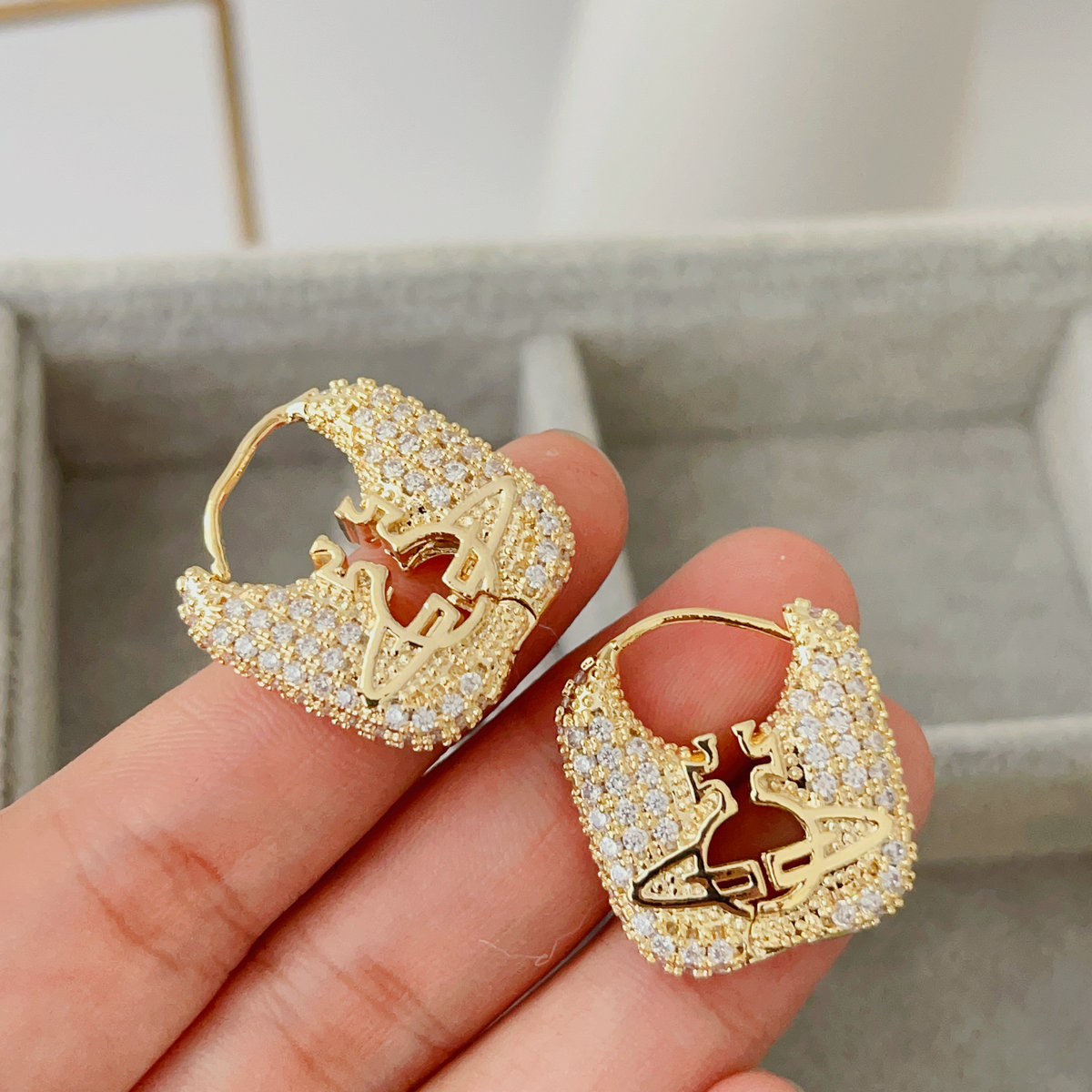 pave planet earrings