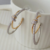 Gold and silver pin earrings