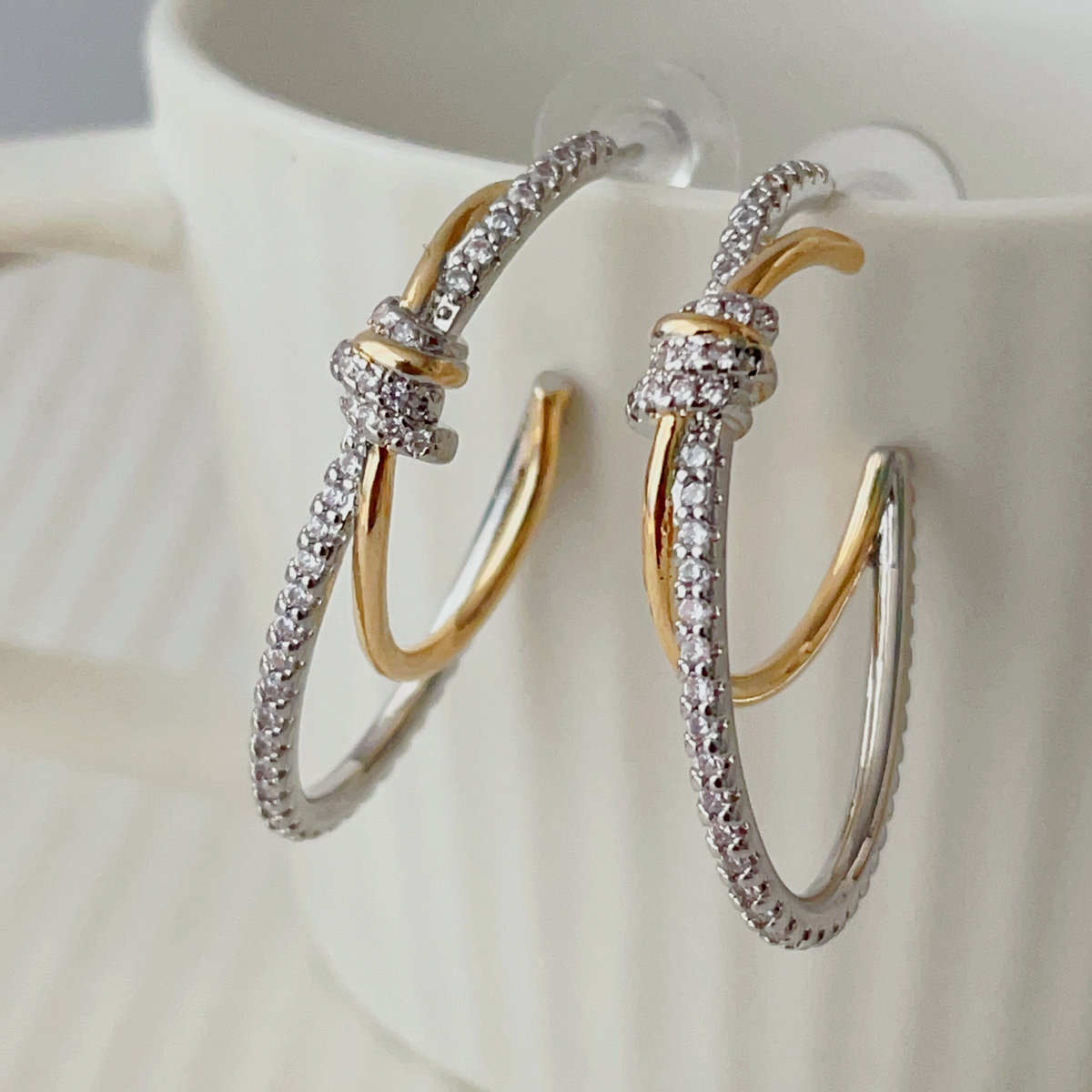 Gold and silver pin earrings