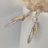 Gold and silver pin earrings