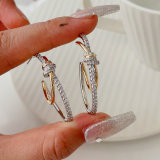 Gold and silver pin earrings