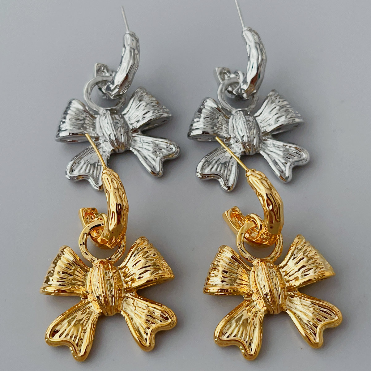Bow pendant earrings