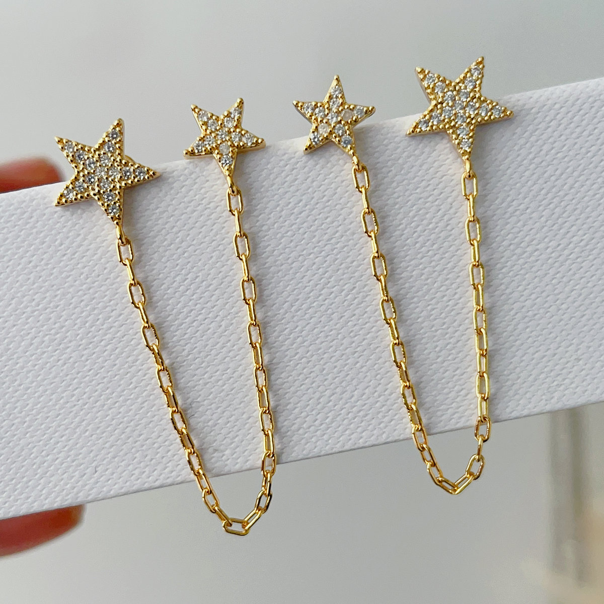 Pave star chain earrings