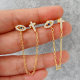 Eye cross chain earrings