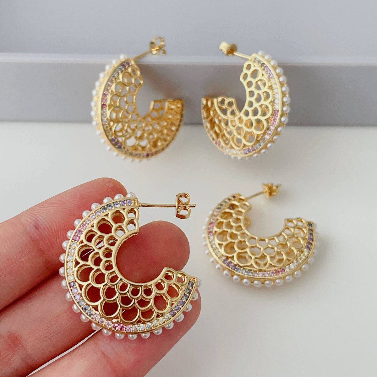 Half moon pearl earrings