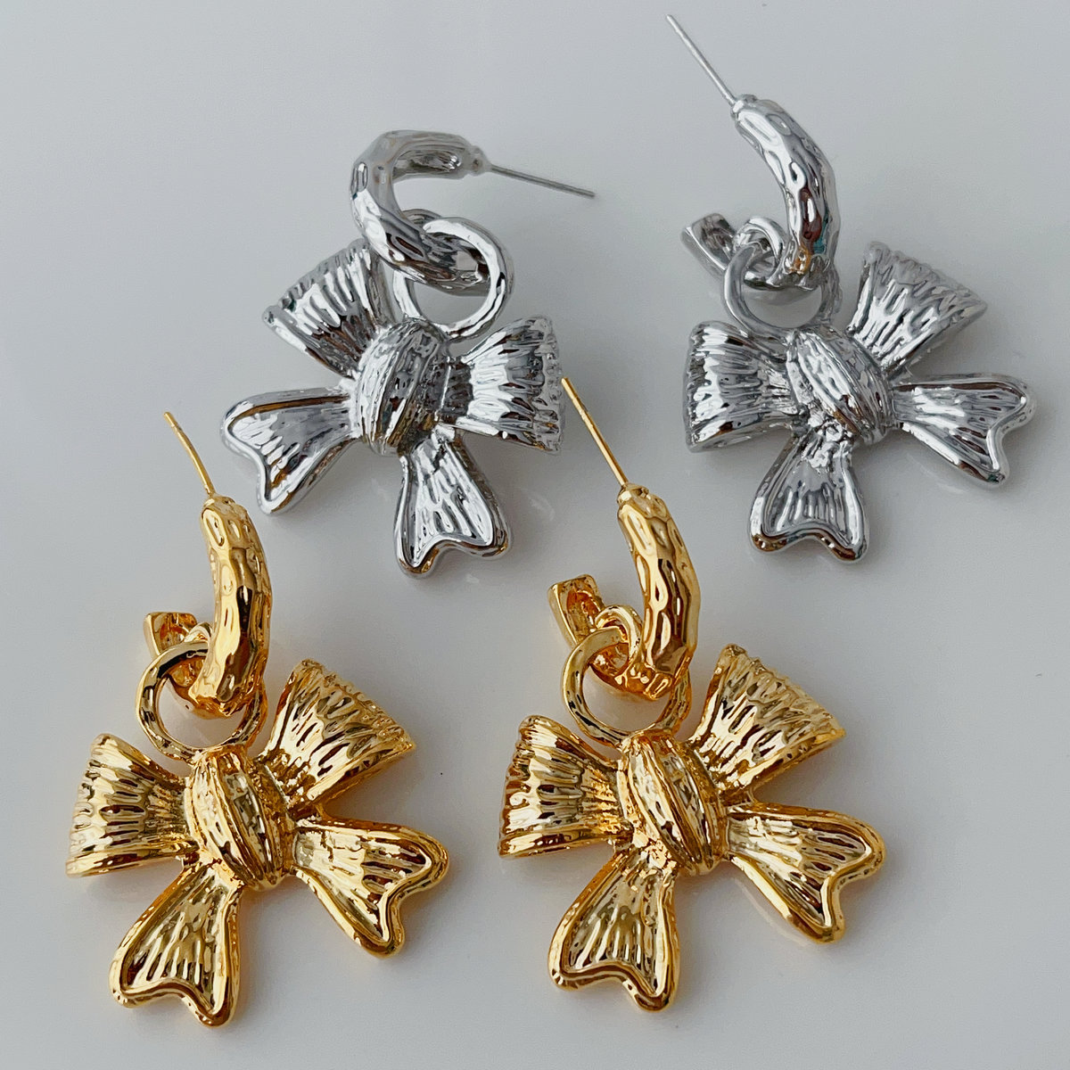 Bow pendant earrings
