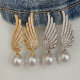 Pave leaf pearl earrings